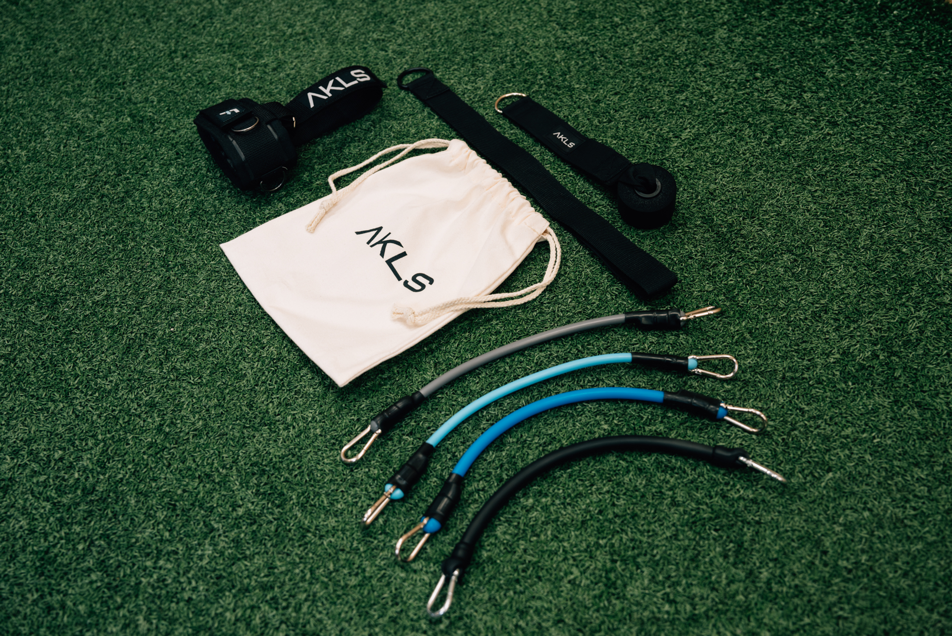 AKLS ankle strengthening system with harness, bands, and anchors for ankle rehab and stability